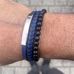 Blauwe armband met leer en parels.