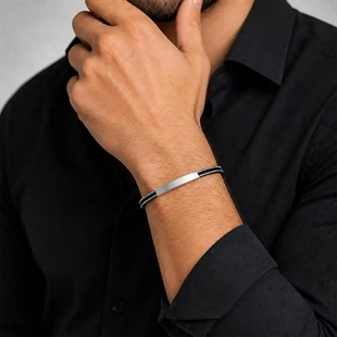 Stijlvolle herenarmband van zwart PU-leer en roestvrij staal