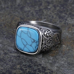 Turquoise Kubal design ring in roestvrij staal en steen.