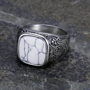 Witte Kubal design ring in roestvrij staal en witte steen.
