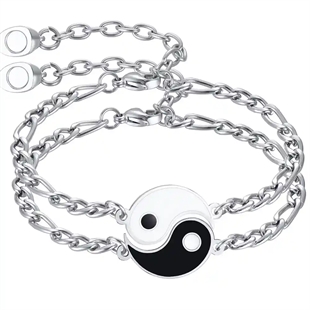 Yin en Yang pararmbanden in roestvrij staal.